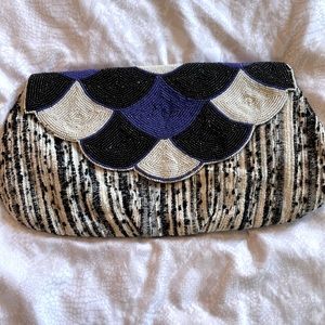 Embroidered clutch